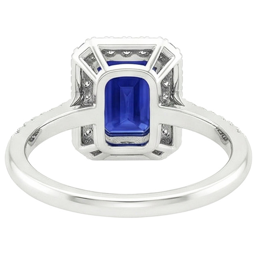 Aus der Erde Abgebauter Natürlicher Diamant-Halo-Ring mit blauen Saphiren an der Seite Smaragd 4,25 Karat