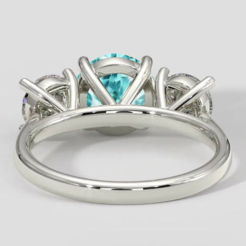 Dreisteinring mit Paraiba-Turmalin und rundem Diamanten