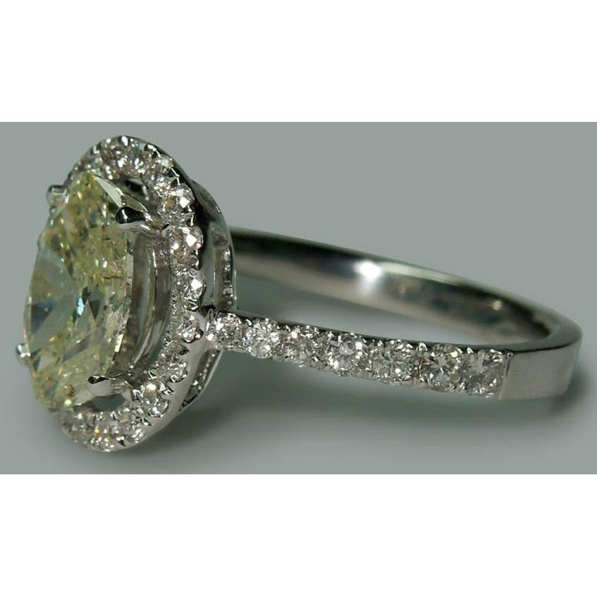 Echt Solitär mit Akzenten 2,03 ct. Ovaler Verlobungsring im Halo-Stil WG 14K