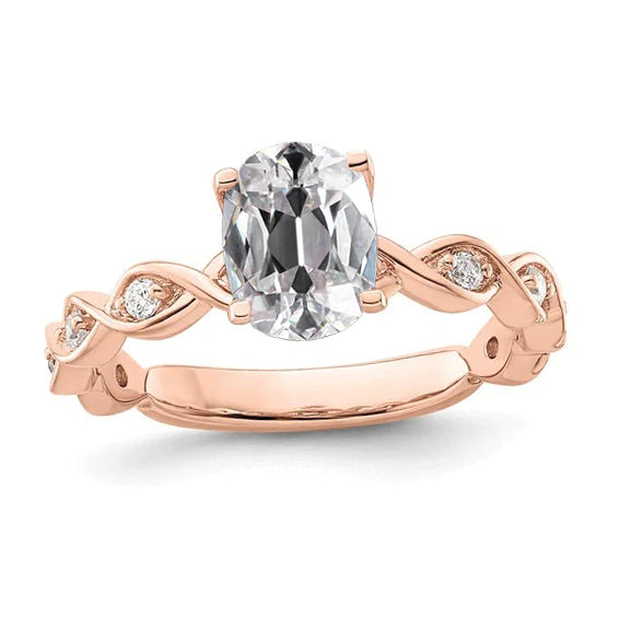 Ovaler Altschliff-Echt Diamantring aus Roségold mit verdrehten Krappen. 3.50 Karat