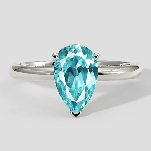 Paraiba-Ring mit Solitärfassung im Tropfenschliff