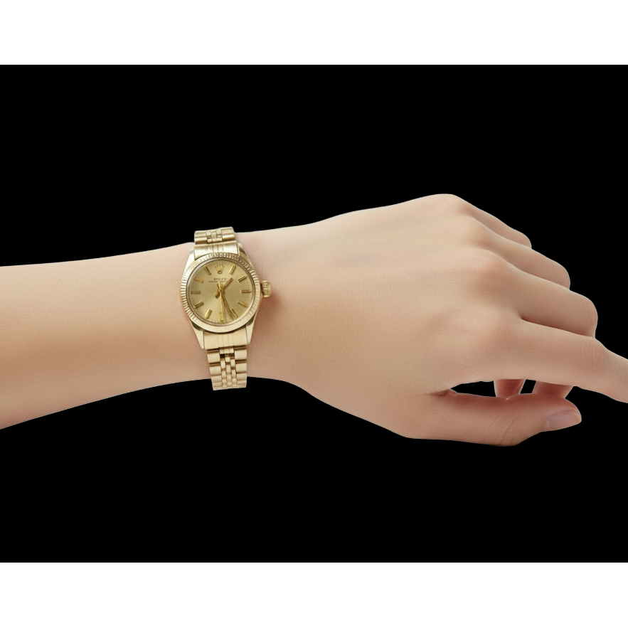 Rolex Oyster Perpetual 24 mm Champagner-Stab-Zifferblatt Gelbgold-Uhr