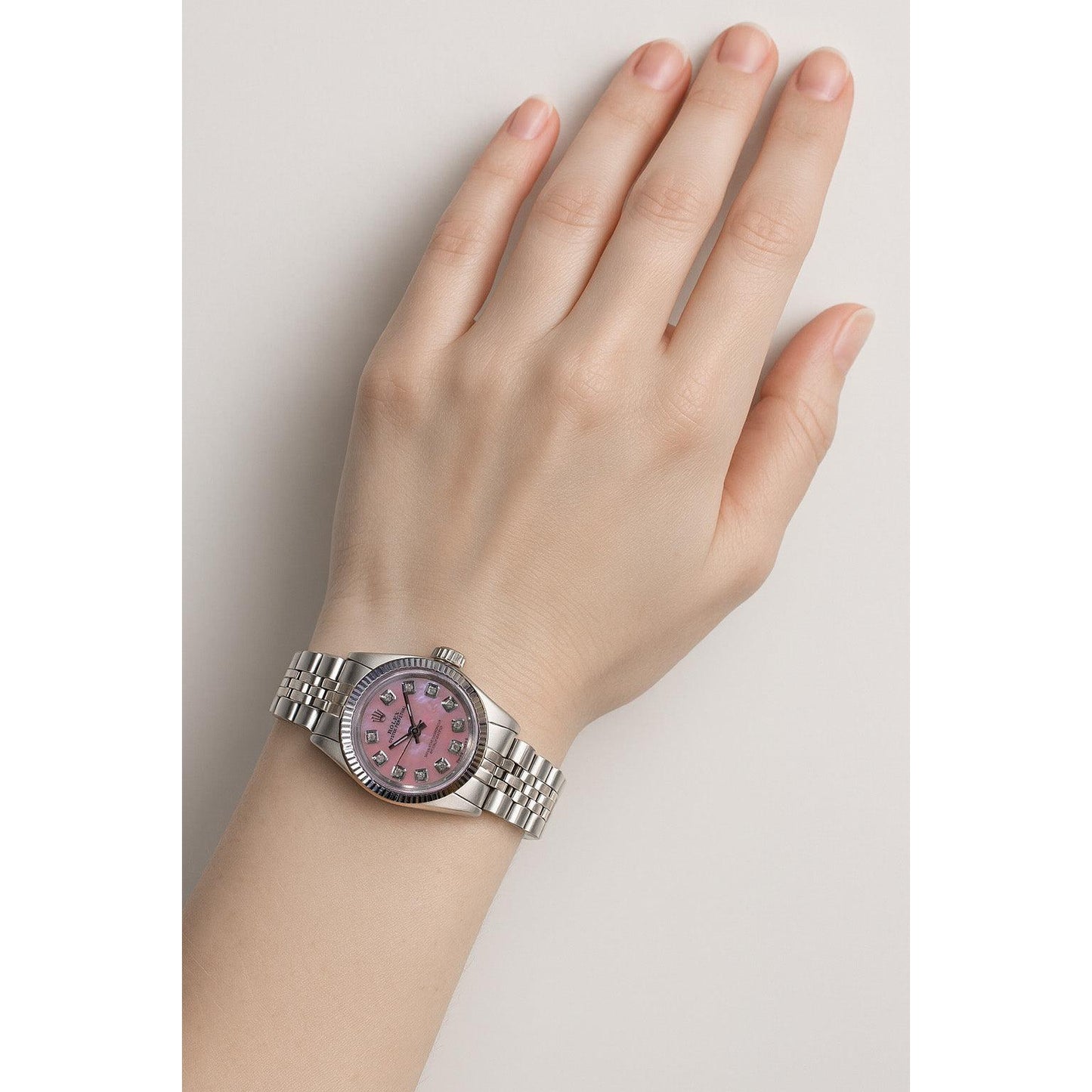 Rolex Uhr Oyster Perpetual Edelstahl geriffelte Lünette Diamant-Zifferblatt