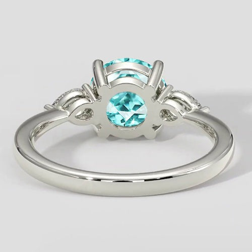Runder Paraiba-Turmalin-Ring mit drei Steinen
