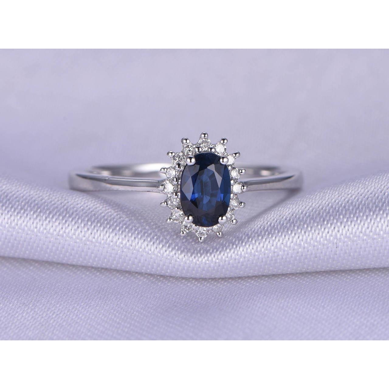 2,5 karat blauer ovalschliff saphir und diamant ring weißgold 14k