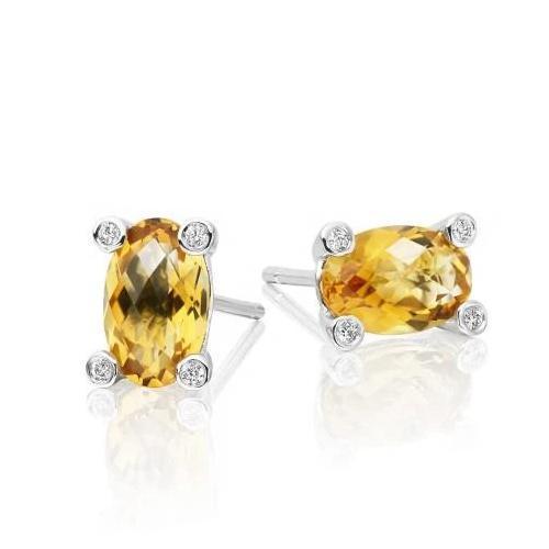 Ovaler Citrin mit rundem Diamant 30,80 Karat Ohrstecker - harrychadent.de