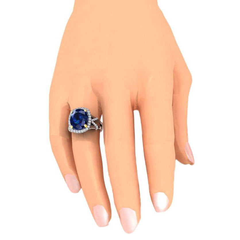 Ovaler blauer Saphir und Diamanten im Rundschliff-Edelsteinring 7.81 Karat