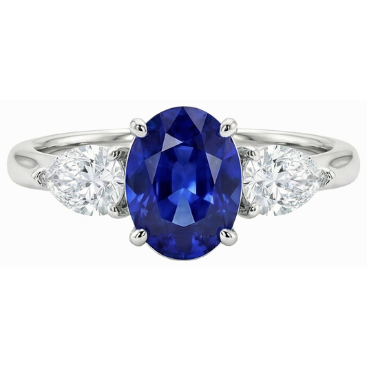 3 Karat drei Steine Oval tiefblauer Saphir & Birnendiamanten