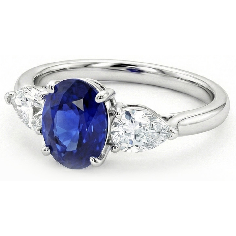 3 Karat drei Steine Oval tiefblauer Saphir & Birnendiamanten