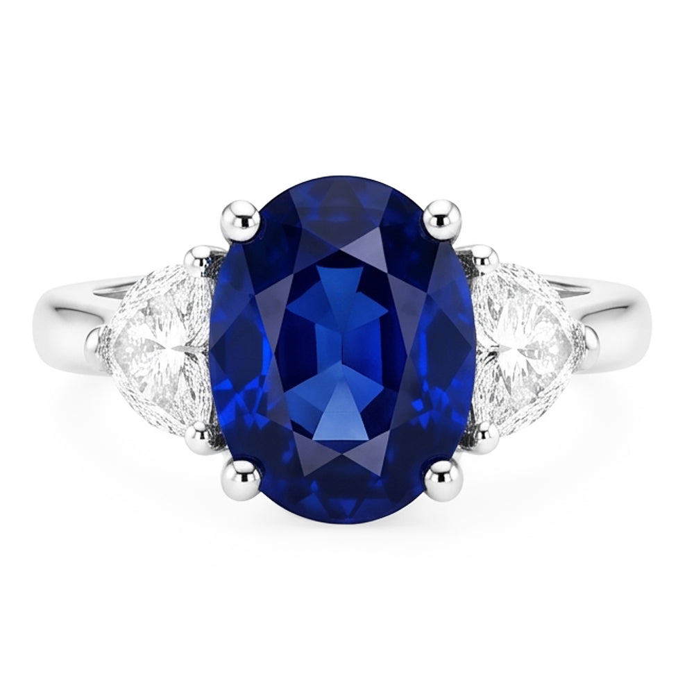 3-Stein-Aus der Erde Abgebauter Natürlicher Diamantring mit ovalem tiefblauem Saphir 8,25 Karat Gold 14K