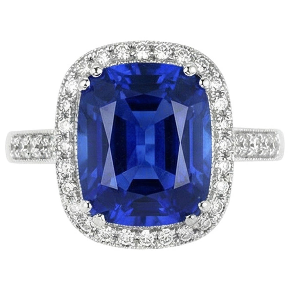 Blauer Saphir-Kissen und Ring mit Aus der Erde Abgebauter Natürlicher Diamanten im Rundschliff von 4.55 Karat WG 14K