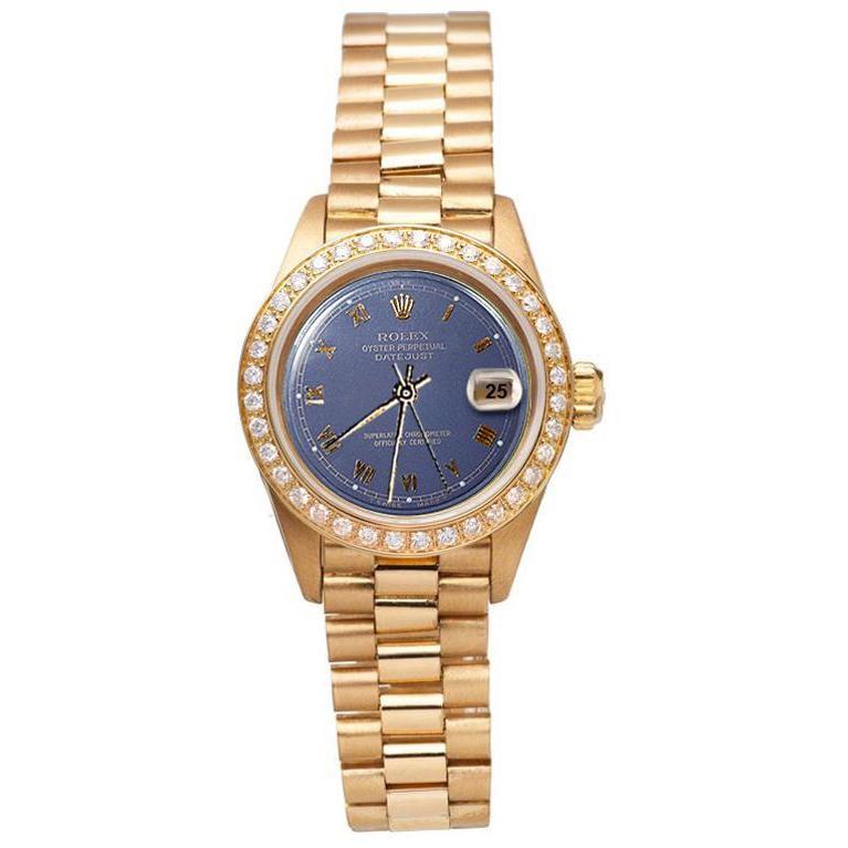 Blaues römisches Zifferblatt Rolex Datejust Präsidentenstil Uhr Diamantlünette Gold
