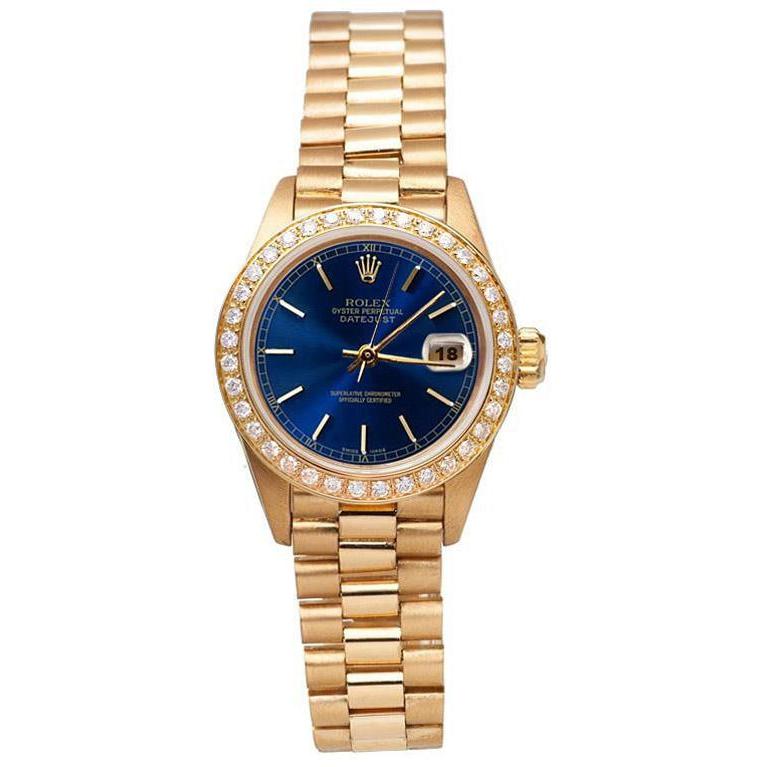 Diamantlünette Rolex Datejust Uhr Dame Präsidentenstil Gold
