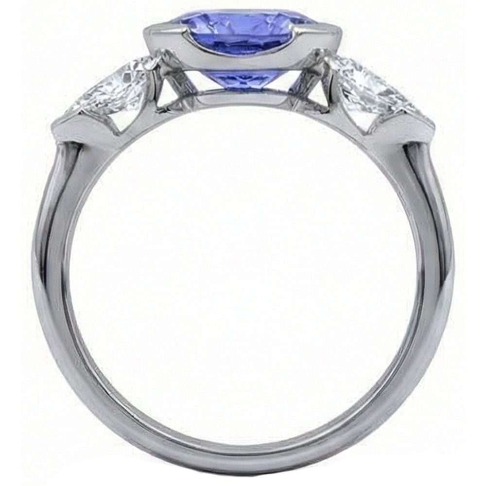 Funkelnder 3-Stein-Ring mit 3 Karat Oval Tansanit und Birnendiamant