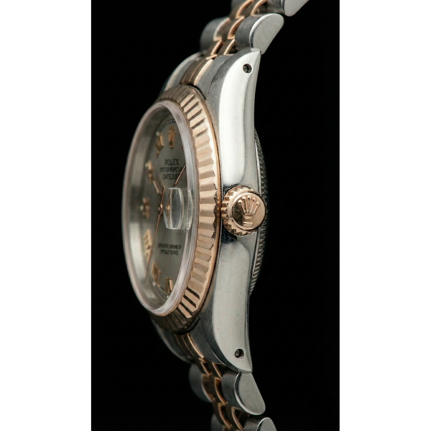 Rolex Date Just Damenuhr aus Edelstahl und geriffelter Lünette aus Gelbgold