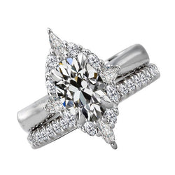 Goldener Halo-Verlobungsring besetzt mit einem ovalen alteuropäischen Echt Diamanten von 7 Karat