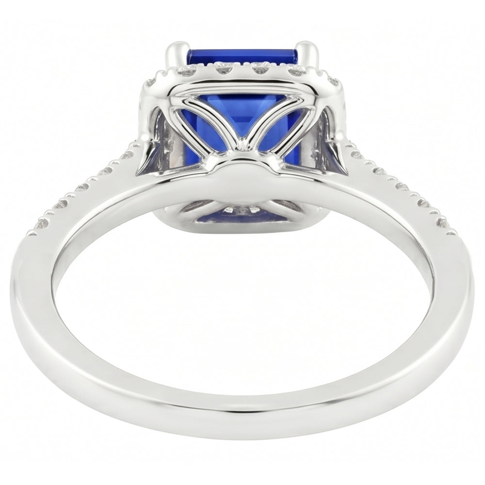 Halo-Ring mit blauem Saphir im Smaragdschliff und Aus der Erde Abgebauter Natürlicher Diamant 4,25 Karat