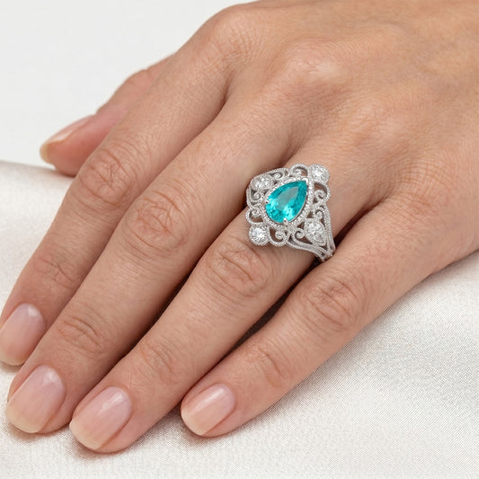 Kunstvoller Halo-Ring mit Vintage Neon Paraiba – 1 Karat