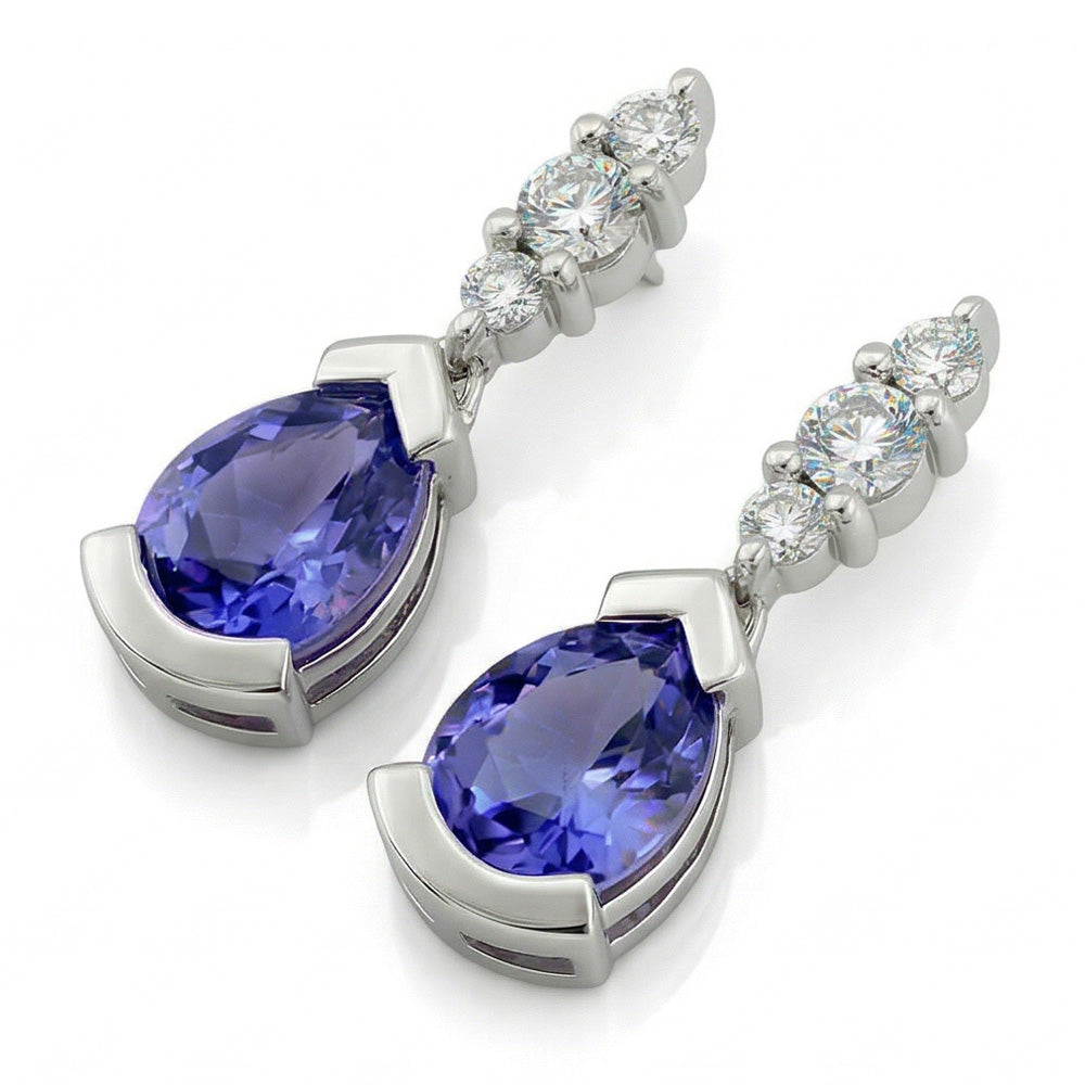 Ohrringe mit 4,60 ct Birne und Ceylon-Saphir im Rundschliff mit Aus der Erde Abgebauter Natürlicher Diamanten