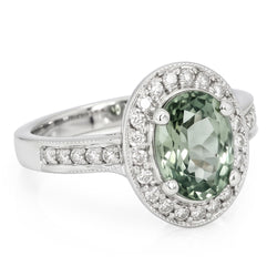 Ovaler grüner Saphir-Halo-Ring