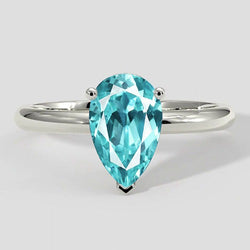 Paraiba-Ring mit Solitärfassung im Tropfenschliff
