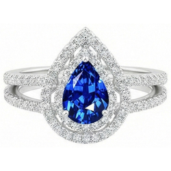 Ring mit 4.90 ct Ceylon-Saphir-Aus der Erde Abgebauter Natürlicher Diamanten in Birne und Rundschliff