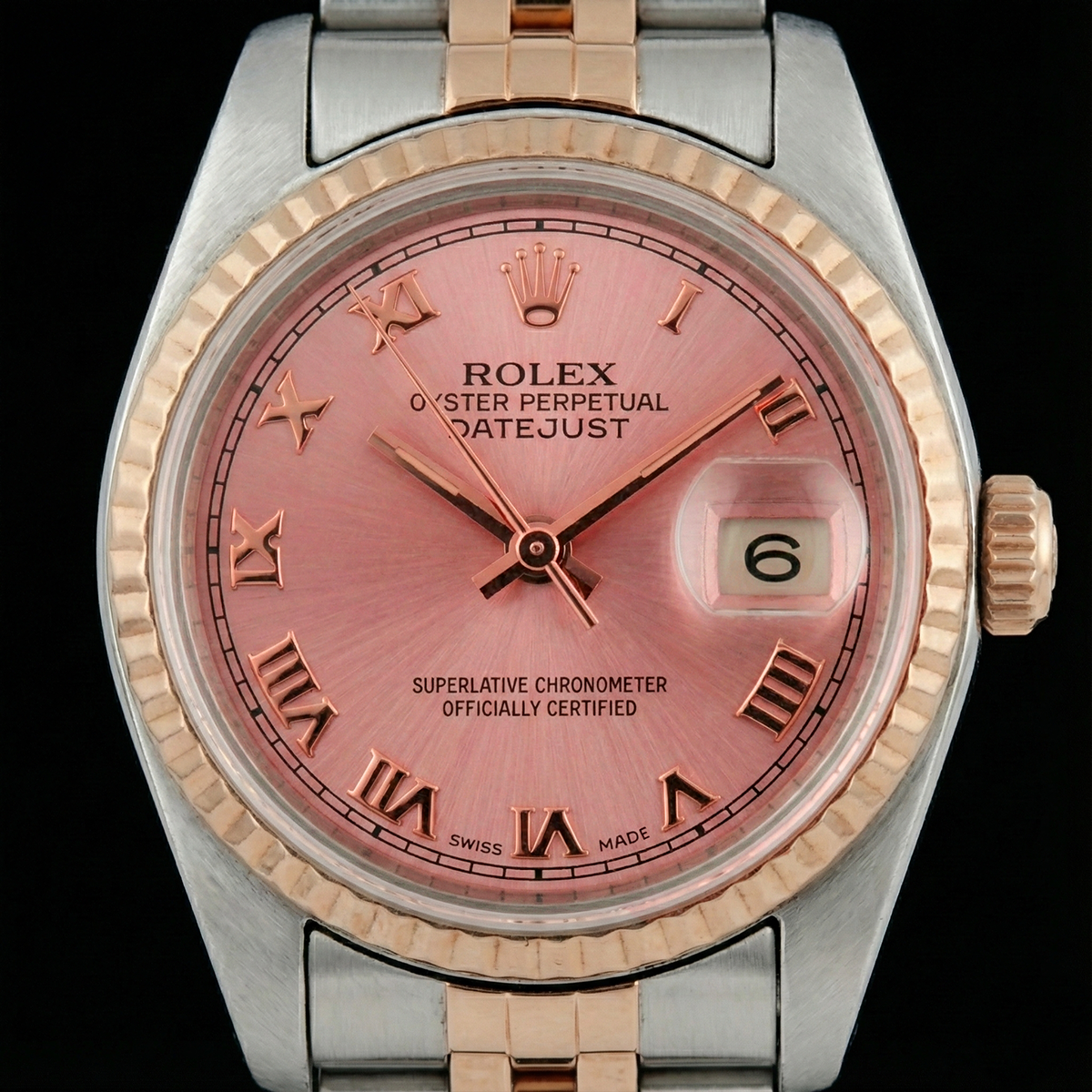 Rolex Datejust Damenuhr aus Edelstahl und Golden mit geriffelter Lünette und römischem Zifferblatt
