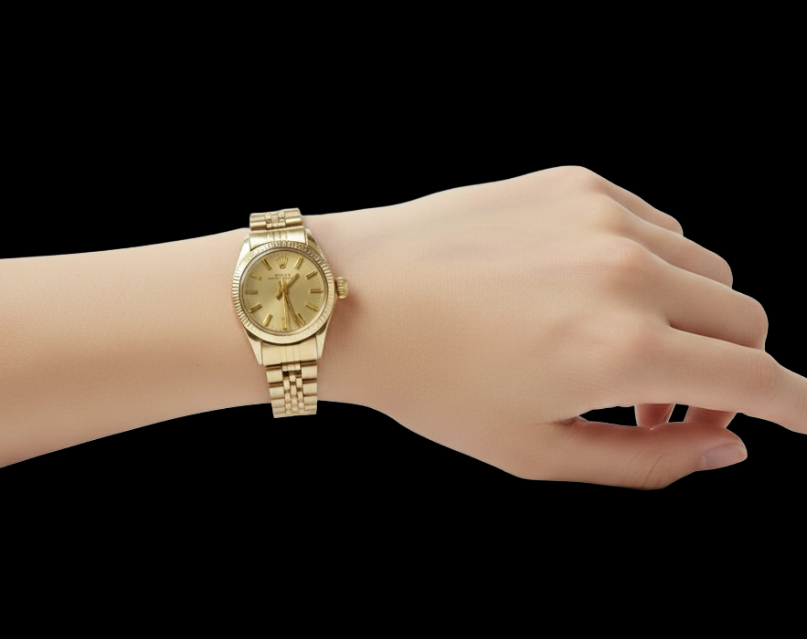 Rolex Oyster Perpetual 24 mm Champagner-Stab-Zifferblatt Gelbgold-Uhr