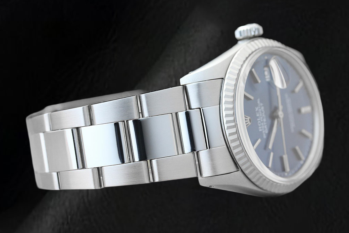 Rolex Datejust 36 mm Uhr aus Edelstahl mit geriffelter Lünette und blauem Zifferblatt mit Stabindizes