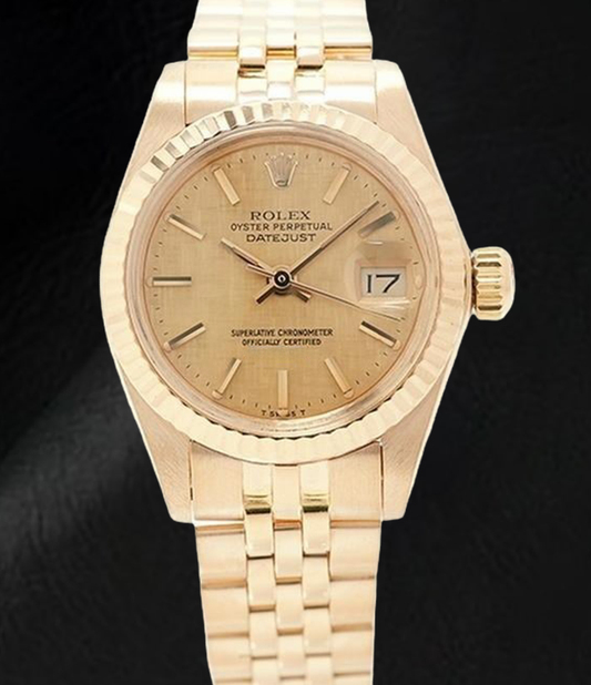 Rolex Datejust 26 mm Damenuhr aus Gelbgold mit champagnerfarbenem Zifferblatt