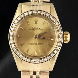 Rolex Oyster Perpetual Damenuhr aus Gelbgold mit Diamantlünette