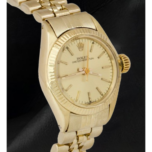 Rolex 24 mm Gelbgold-Uhr mit champagnerfarbenem Stabzifferblatt