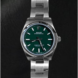Rolex 31 mm Herrenuhr mit grüner Leuchtmasse