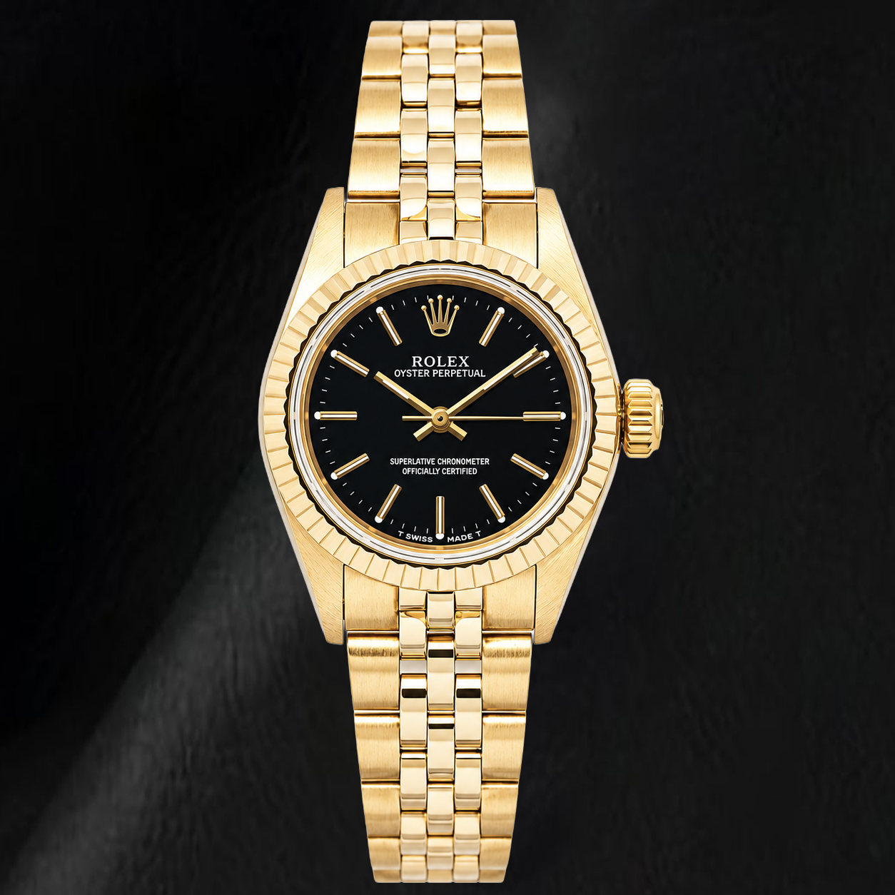 Rolex 67197 Oyster Perpetual Schwarzes Zifferblatt mit Stabindizes 24mm Gelbgold Damenuhr