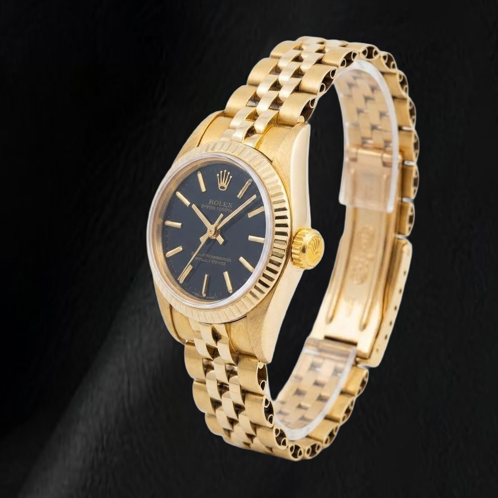 Rolex 67197 Oyster Perpetual Schwarzes Zifferblatt mit Stabindizes 24mm Gelbgold Damenuhr