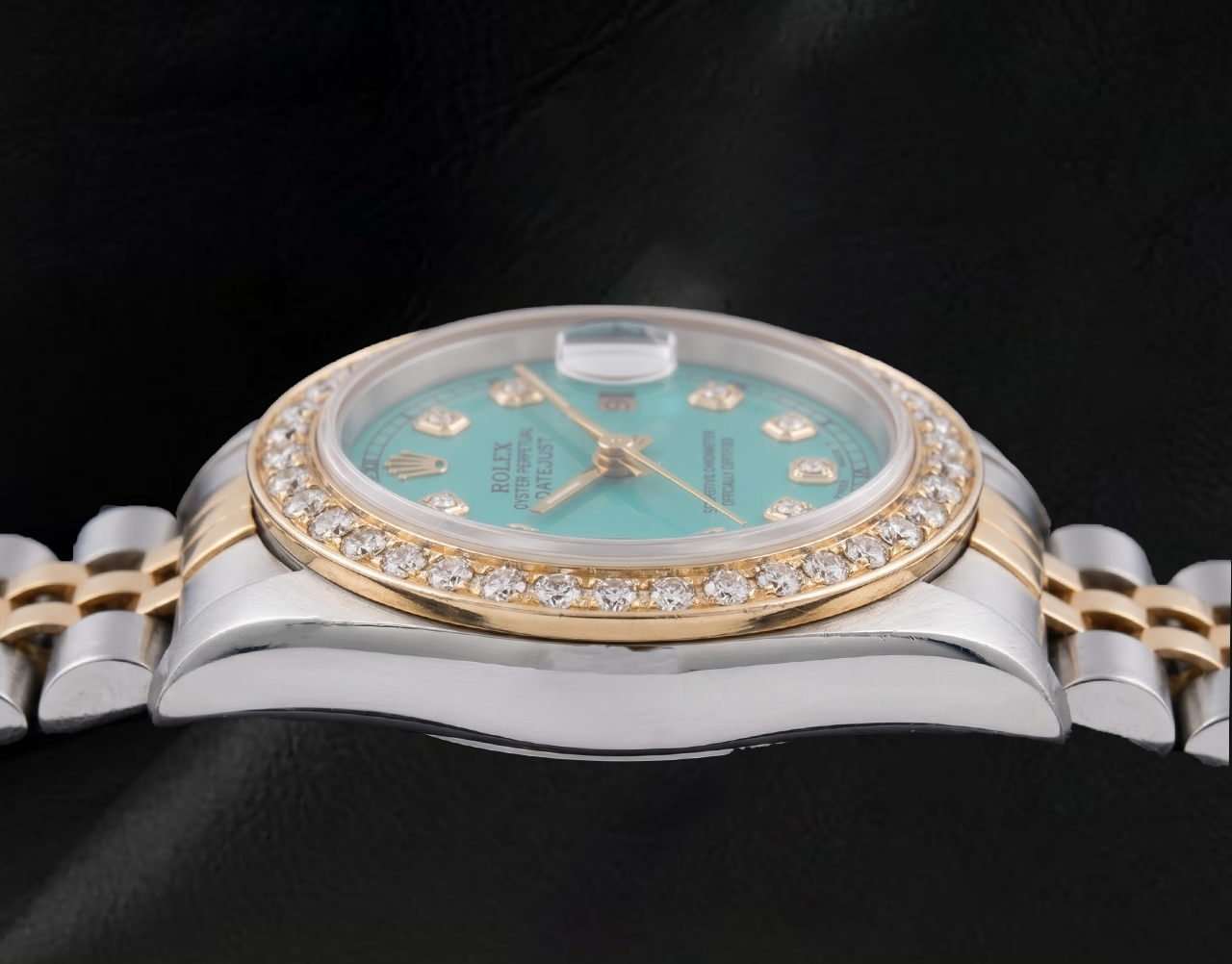 Rolex 69173 Datejust 26 mm Türkises Diamantzifferblatt Gelbgold und Edelstahl Uhr