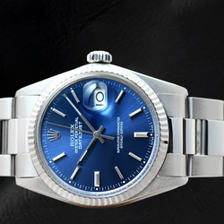 Rolex Datejust 36 mm Uhr aus Edelstahl mit geriffelter Lünette und blauem Zifferblatt mit Stabindizes
