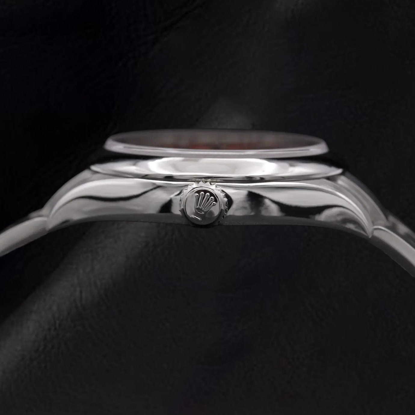 Rolex Dame Oyster Perpetual 31 mm korallenrote Stahluhr mit leuchtendem Zifferblatt