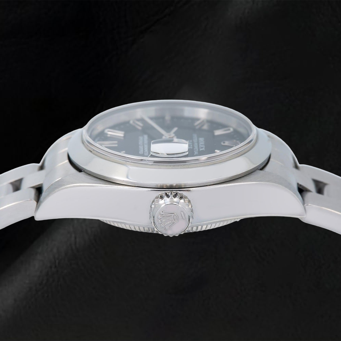 Rolex Date 6916 26 mm Uhr aus Edelstahl, schwarzes Zifferblatt mit Stabindizes, glatte Lünette