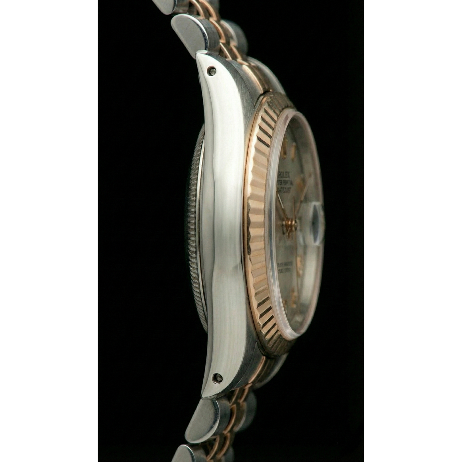 Rolex Date Just Damenuhr aus Edelstahl und geriffelter Lünette aus Gelbgold