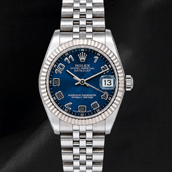 Rolex Datejust 31 mm 178274 Uhr, blaues Zifferblatt mit arabischen Ziffern, geriffelte Lünette aus Weißgold