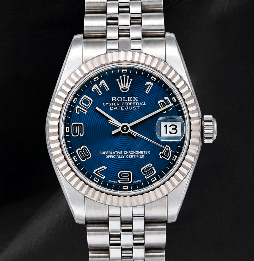 Rolex Datejust 31 mm 178274 Uhr, blaues Zifferblatt mit arabischen Ziffern, geriffelte Lünette aus Weißgold