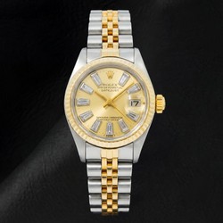Rolex Datejust 69173 26 mm Bicolor Uhr mit champagnerfarbenem Baguette-Diamantzifferblatt