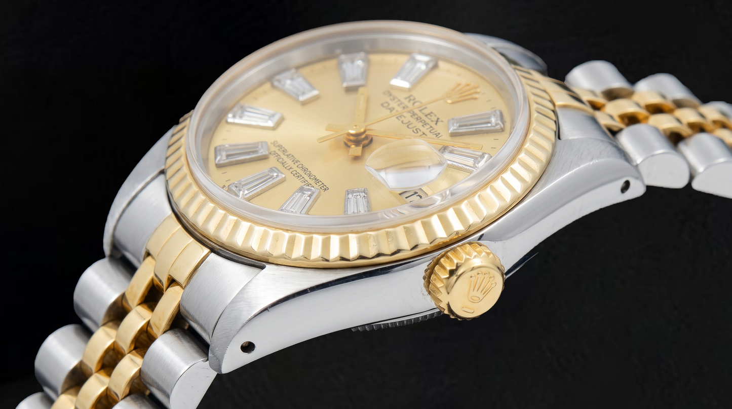 Rolex Datejust 69173 26 mm Bicolor Uhr mit champagnerfarbenem Baguette-Diamantzifferblatt