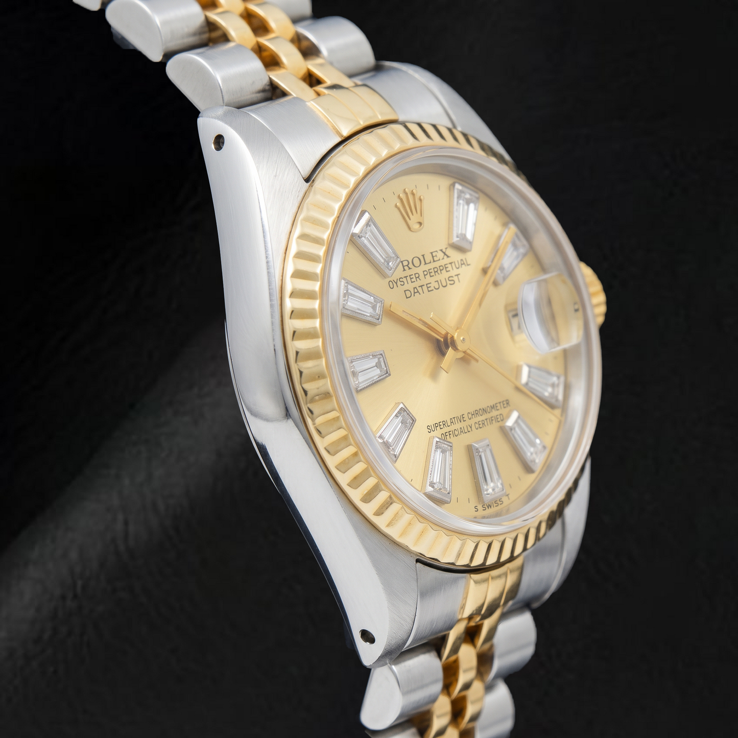 Rolex Datejust 69173 26 mm Bicolor Uhr mit champagnerfarbenem Baguette-Diamantzifferblatt