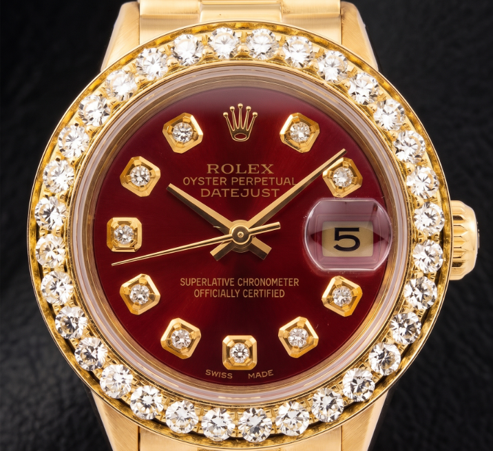 Rolex Datejust 6917 26 mm Armbanduhr aus Gelbgold mit rotem Diamantzifferblatt und President-Armband