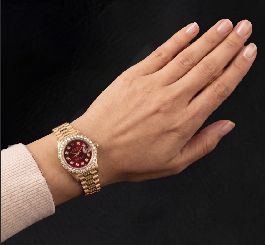 Rolex Datejust 6917 26 mm Armbanduhr aus Gelbgold mit rotem Diamantzifferblatt und President-Armband