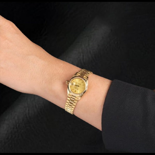 Rolex Datejust im Präsidentenstil, 26 mm, champagnerfarbenes Zifferblatt, Gelbgold, Damenuhr