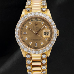 Rolex Day-Date 18038 36 mm Uhr aus 18 Karat Gelbgold mit Champagner-Diamantzifferblatt