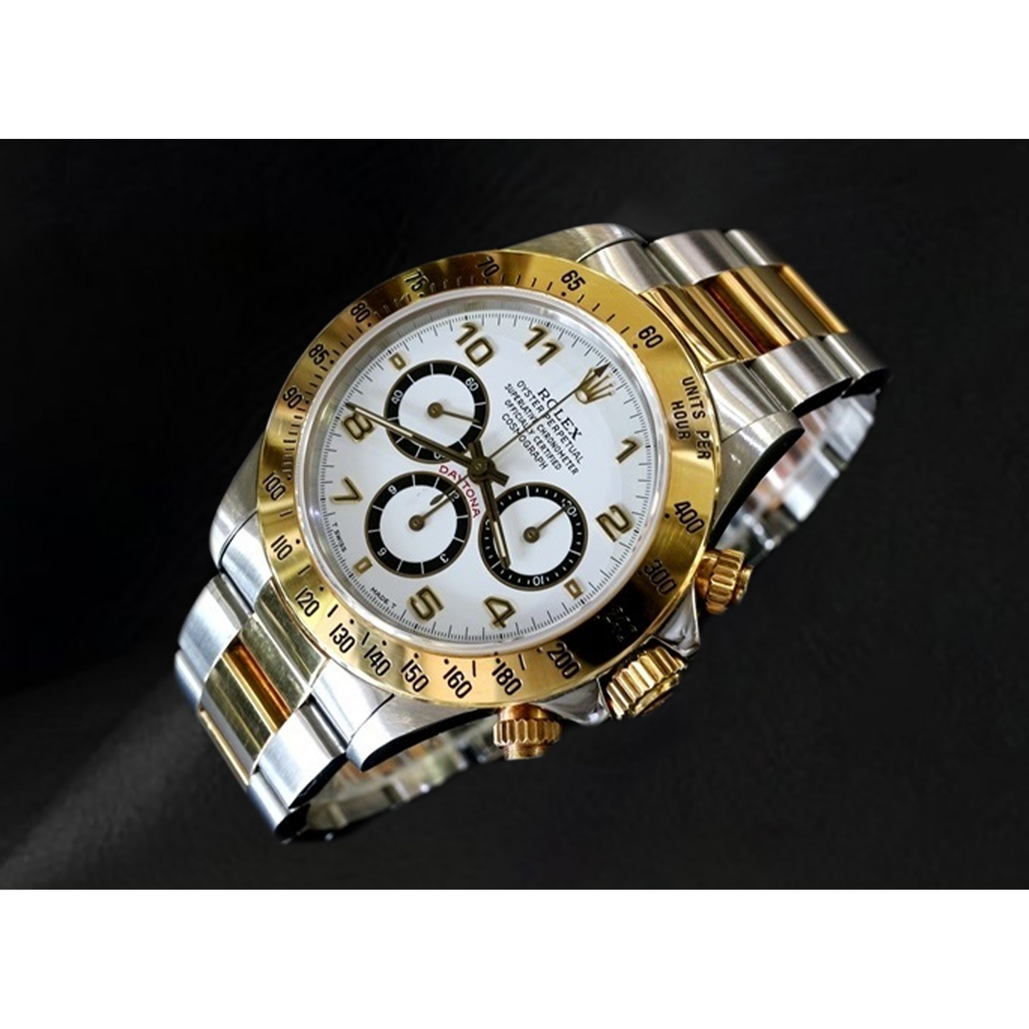 Rolex Daytona Cosmograph Uhr aus Edelstahl und Gelbgold mit arabischem Zifferblatt